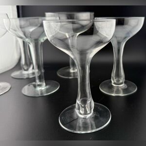 6 Hollow stemmed champagne flutes. Various sizes.